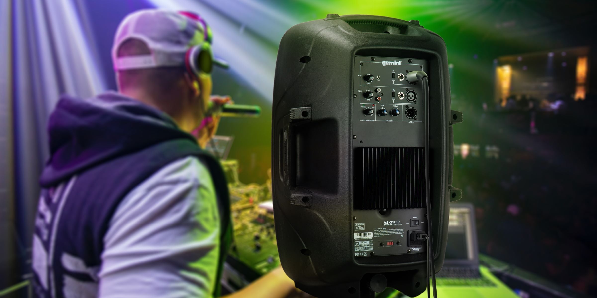Modern PA system setup with high-quality speakers, mixers, and microphones in a high-end event setting, featuring the subtle Gemini Sound logo, exemplifying professional audio excellence.