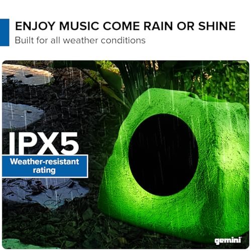 Gemini Sound solar Bluetooth rock speaker in gray stone finish with LED light, designed for outdoor use and waterproof.