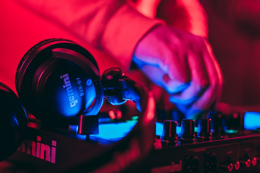 person operating a gemini DJ table
